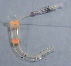 Figure 6. Attach the remainder of the IV tubing to laryngoscope blade with tape.