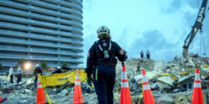 Dr. Benjamin Abo surveys the Surfside scene as part of his role to oversee recovery operations and assure the safety and welfare of the rescue teams.